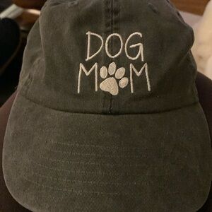 Hat with say, “DOG MOM”  adjustable back. Fits all.